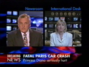 Nik Gowing in the BBC newsroom  and Maxine Mawhinney at the "international desk".